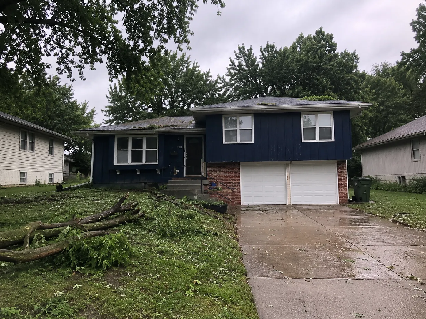 Kansas City house with storm and exterior damage
