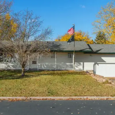 White House With Split Level Garage Sq 400px